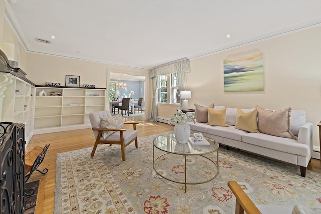 19 Ridge Rd, Newton, MA 02468 - living area featuring ornamental molding, wood finished floors, baseboard heating, a chandelier, and recessed lighting