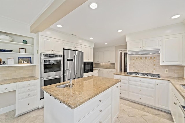 19 Ridge Rd, Newton, MA 02468 - kitchen with stainless steel appliances, a sink, light tile patterned floors, tasteful backsplash, and recessed lighting
