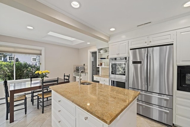 19 Ridge Rd, Newton, MA 02468 - kitchen featuring appliances with stainless steel finishes, a sink, light stone counters, open shelves, and recessed lighting