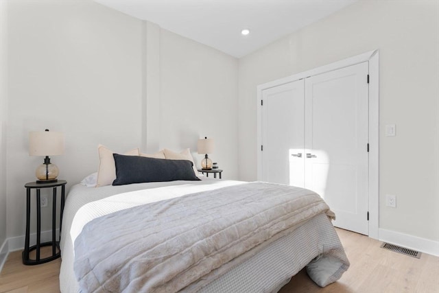 62 Haynes Unit 201, Boston, MA 02128 - bedroom featuring light wood-style flooring, baseboards, and a closet