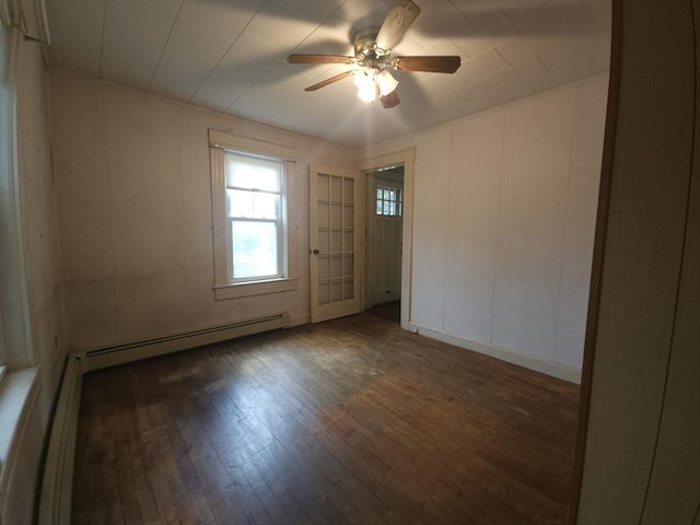 45 Circuit Ave E, Worcester, MA 01603 - empty room with a baseboard heating unit, hardwood / wood-style flooring, and a ceiling fan