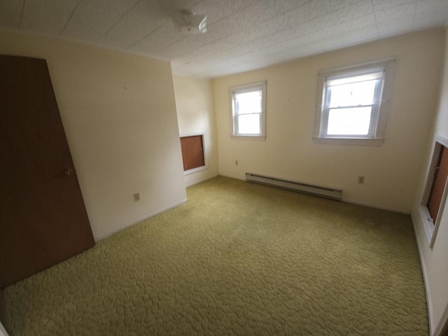 45 Circuit Ave E, Worcester, MA 01603 - empty room with baseboard heating and carpet