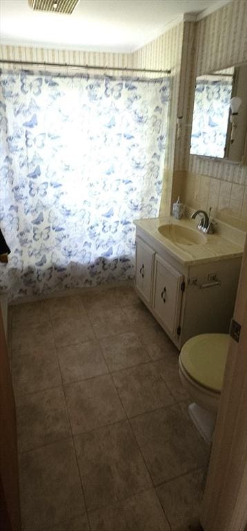 45 Circuit Ave E, Worcester, MA 01603 - full bath with ornamental molding, vanity, and tile patterned flooring