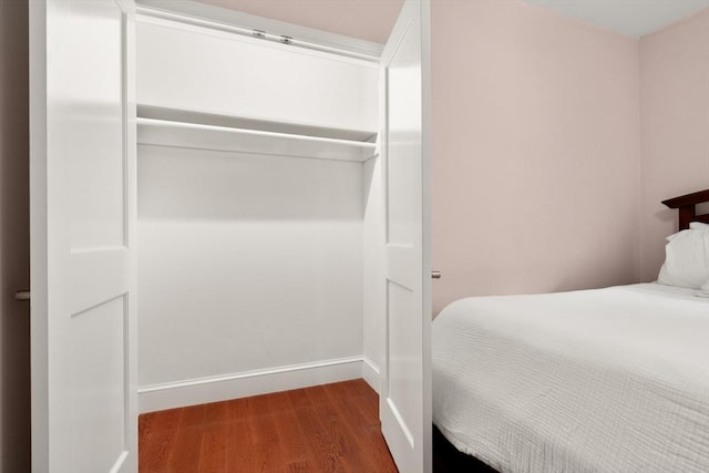 106 Walnut St Unit 2, Somerville, MA 02145 - bedroom featuring wood finished floors and baseboards