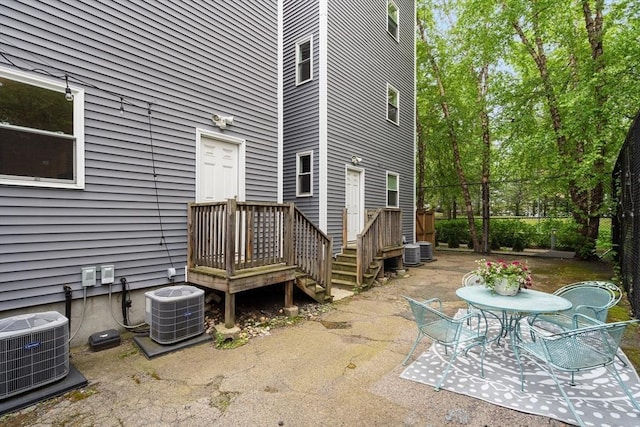 106 Walnut St Unit 2, Somerville, MA 02145 - view of patio with central AC unit and outdoor dining area