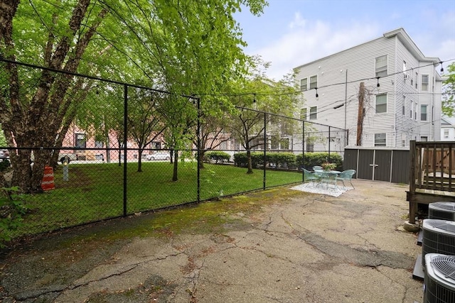 106 Walnut St Unit 2, Somerville, MA 02145 - view of yard with cooling unit and a patio