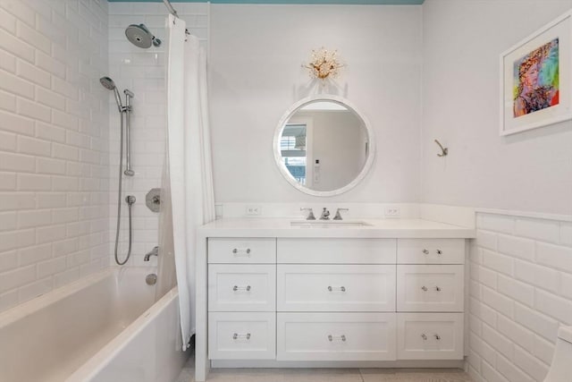 bathroom with shower / bath combination with curtain and vanity