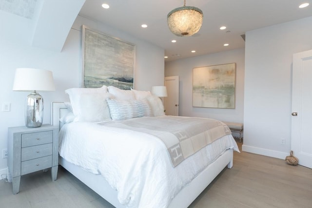 bedroom featuring light hardwood / wood-style floors