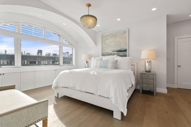 bedroom with light hardwood / wood-style flooring