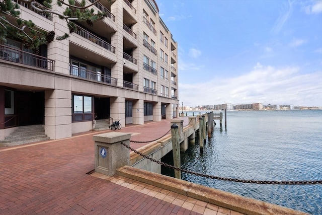 dock area featuring a water view