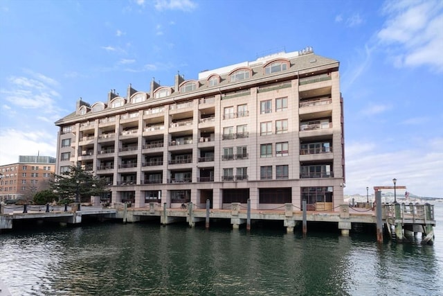 view of property with a water view