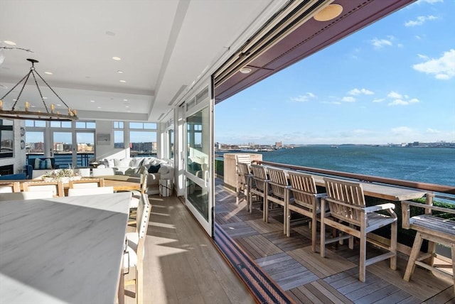 balcony featuring a water view