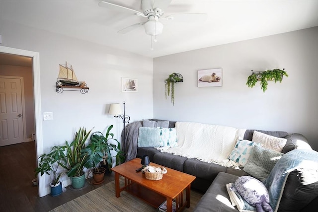 living area with ceiling fan and wood finished floors