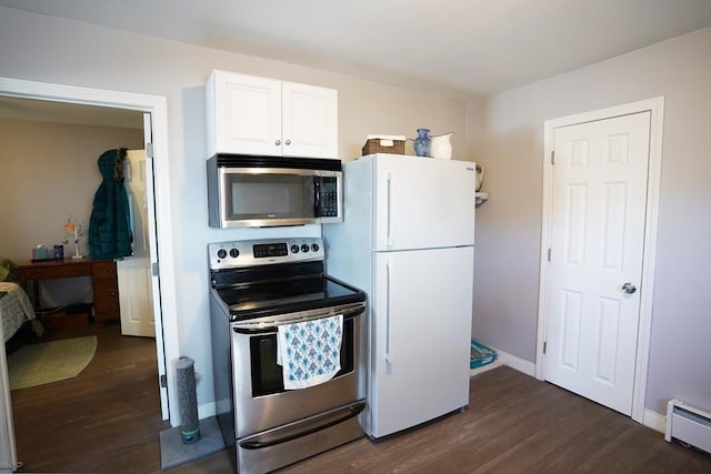 kitchen with dark wood-style floors, stainless steel appliances, a baseboard radiator, white cabinets, and baseboards