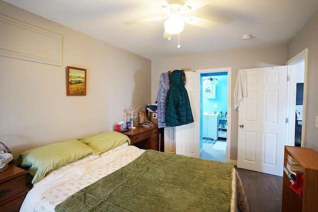 bedroom with dark wood-style floors and a ceiling fan