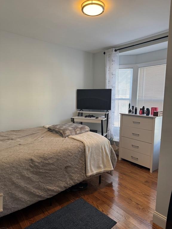 bedroom with light hardwood / wood-style flooring