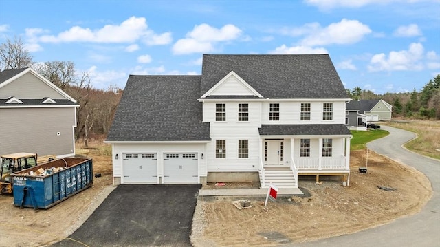 66 Parish Rd Unit 3, Georgetown, MA 01833 - view of front facade featuring driveway, a porch, an attached garage, and roof with shingles