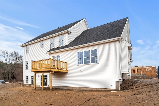 66 Parish Rd Unit 3, Georgetown, MA 01833 - rear view of house with a deck and roof with shingles