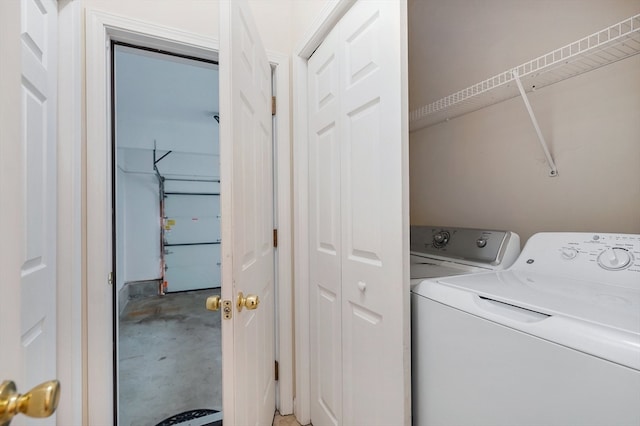 laundry room with independent washer and dryer