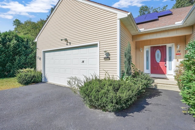 exterior space featuring a garage