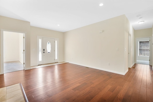 foyer with hardwood / wood-style flooring