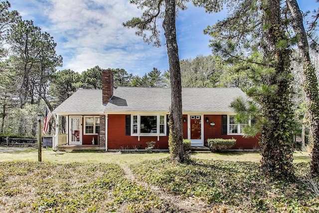 49 Lady Slipper Dr, Dennis, MA 02638 - ranch-style home featuring a front yard and a chimney