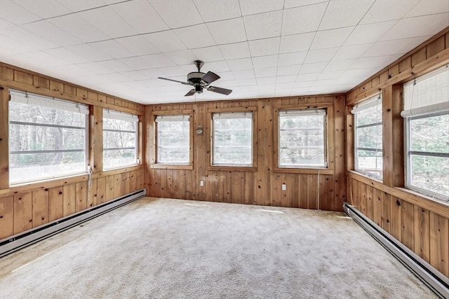 49 Lady Slipper Dr, Dennis, MA 02638 - unfurnished sunroom featuring plenty of natural light, carpet, and a baseboard heating unit