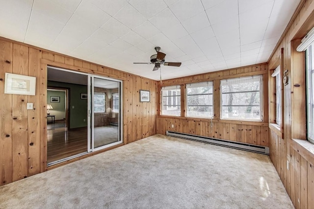 49 Lady Slipper Dr, Dennis, MA 02638 - unfurnished sunroom featuring a baseboard radiator