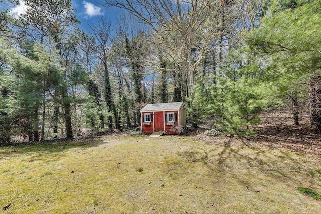 49 Lady Slipper Dr, Dennis, MA 02638 - view of yard featuring a storage shed and an outbuilding