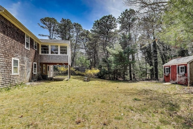 49 Lady Slipper Dr, Dennis, MA 02638 - view of yard featuring a storage unit and an outdoor structure