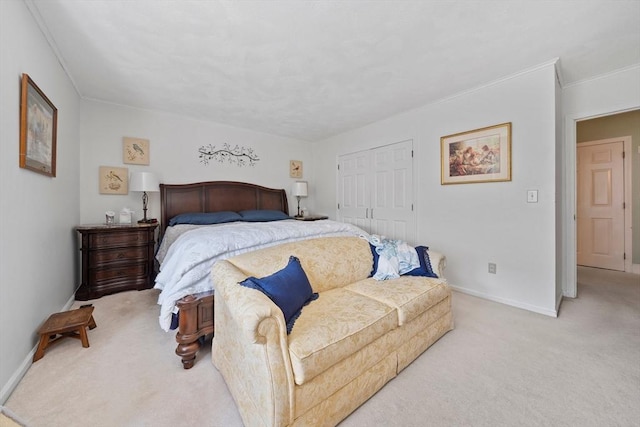 23 Rufus Jones Ln Unit 23, Easton, MA 02356 - bedroom with light colored carpet, a closet, baseboards, and ornamental molding