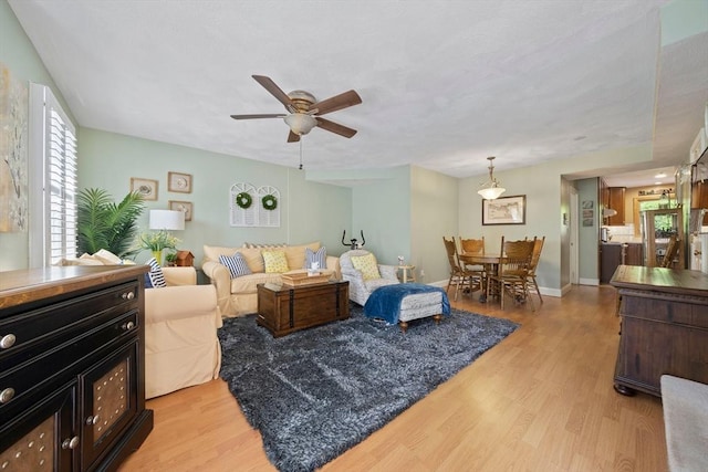 23 Rufus Jones Ln Unit 23, Easton, MA 02356 - living area featuring light wood-type flooring and a ceiling fan