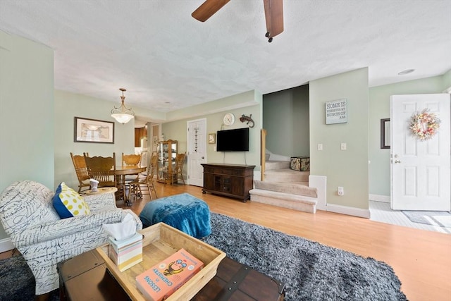 23 Rufus Jones Ln Unit 23, Easton, MA 02356 - living area with wood finished floors, ceiling fan, and baseboards
