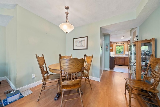 23 Rufus Jones Ln Unit 23, Easton, MA 02356 - dining room with light wood-style floors and baseboards