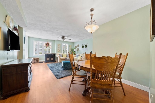 23 Rufus Jones Ln Unit 23, Easton, MA 02356 - dining room featuring light wood-style floors, ceiling fan, baseboards, and a textured ceiling
