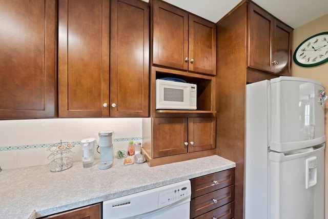 23 Rufus Jones Ln Unit 23, Easton, MA 02356 - kitchen with white appliances, light countertops, and tasteful backsplash