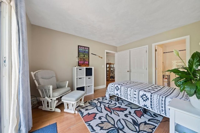 23 Rufus Jones Ln Unit 23, Easton, MA 02356 - bedroom featuring wood finished floors, a closet, and baseboards