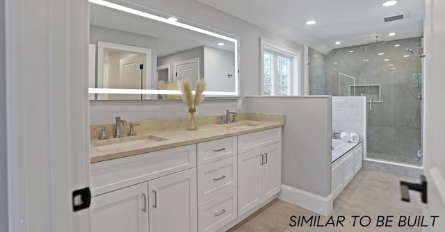 10 Webber Ave Unit 4D, Bedford, MA 01730 - full bathroom featuring a stall shower, a garden tub, double vanity, and recessed lighting