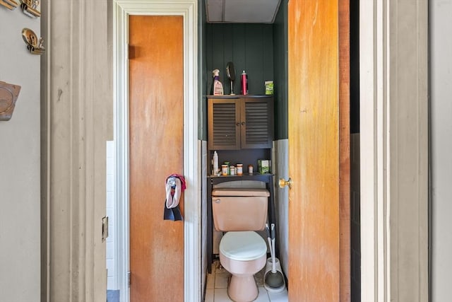 bathroom with tile patterned flooring and toilet