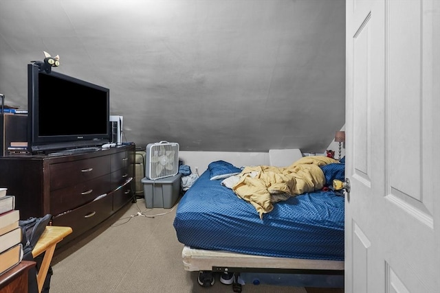 bedroom with light colored carpet