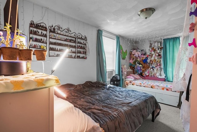 carpeted bedroom featuring a textured ceiling