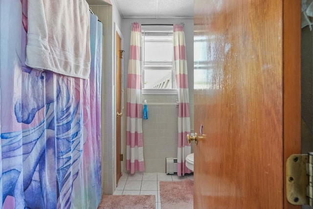 bathroom with tile patterned flooring