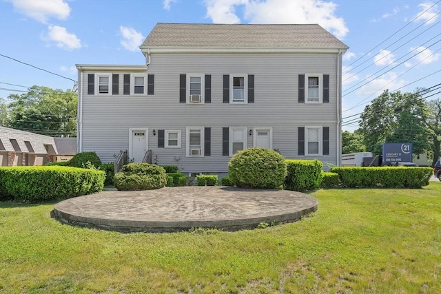 view of front of house with a front lawn