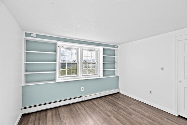 51 Shore Dr, Plymouth, MA 02360 - unfurnished room featuring a baseboard radiator, wood finished floors, and baseboards