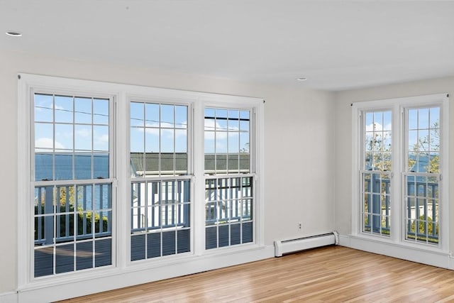 51 Shore Dr, Plymouth, MA 02360 - entryway with a baseboard radiator, wood finished floors, a water view, and recessed lighting