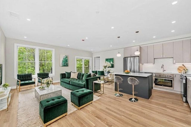 42 Waverly Unit 1, Boston, MA 02135 - living room with light wood-type flooring and recessed lighting