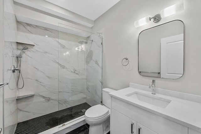 42 Waverly Unit 1, Boston, MA 02135 - bathroom featuring vanity, toilet, and a marble finish shower