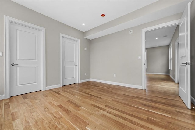 42 Waverly Unit 1, Boston, MA 02135 - unfurnished bedroom featuring light wood-style floors, baseboards, and recessed lighting