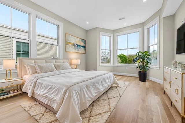 42 Waverly Unit 1, Boston, MA 02135 - bedroom featuring light wood-style floors, baseboards, and recessed lighting