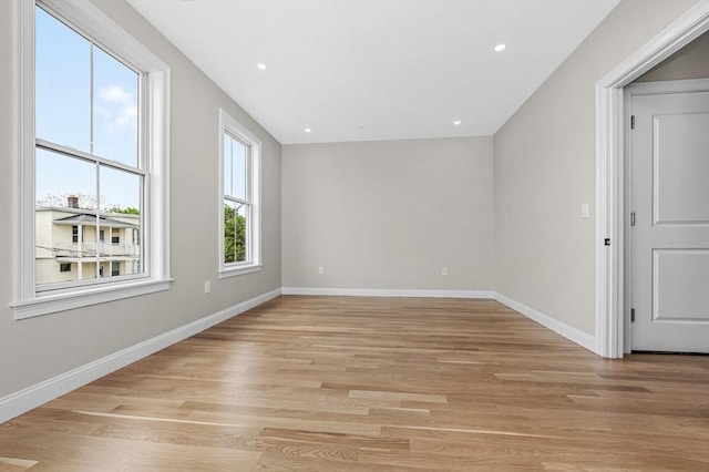 42 Waverly Unit 1, Boston, MA 02135 - unfurnished room with baseboards, light wood-style flooring, and recessed lighting
